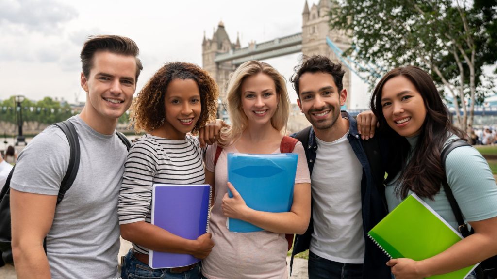 Diverse group of multi-ethnic English students in London, representing a multicultural learning environment. Study in the UK for a diverse education experience.